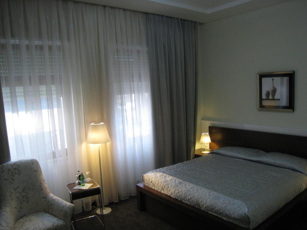 Boutique Hotel Kotoni Tirana Habitación foto