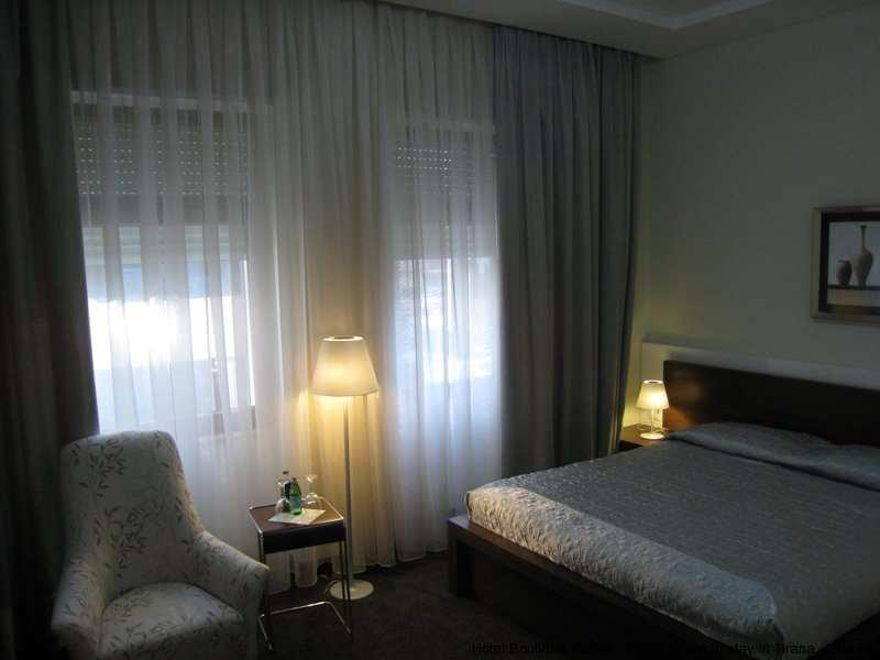 Boutique Hotel Kotoni Tirana Habitación foto